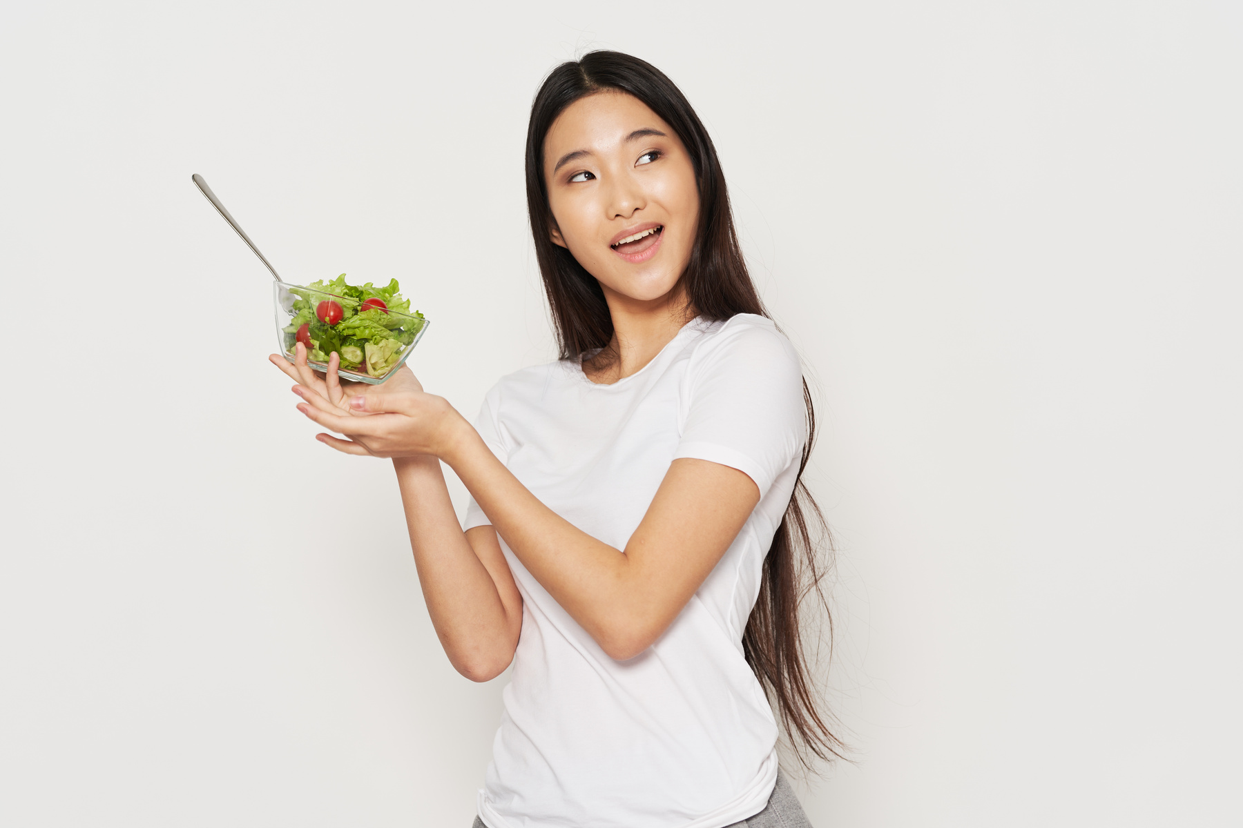 Happy Asian Woman with Salad in a Plate Diet Food and Calories